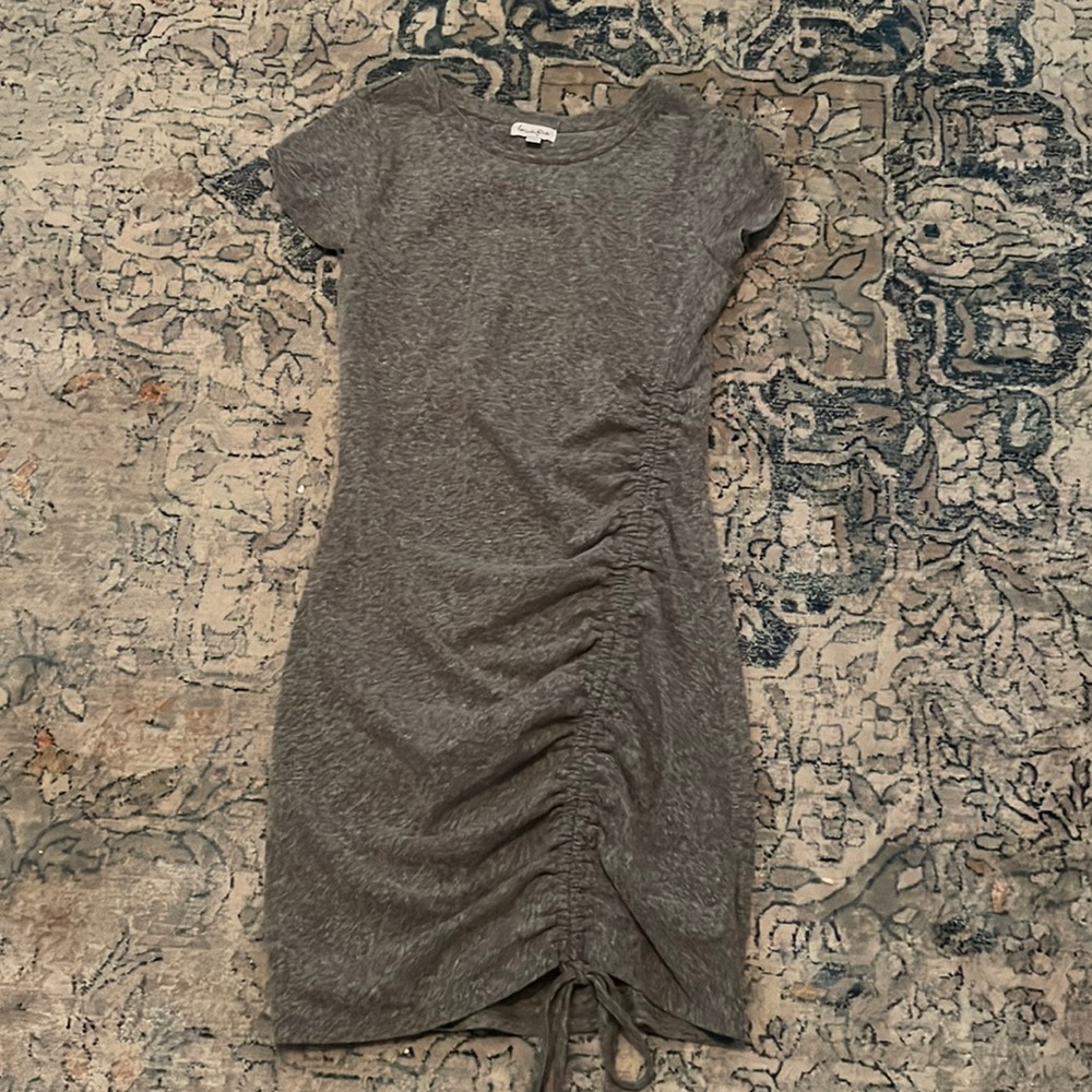 I am selling a grey dress with a scrunch on one side.